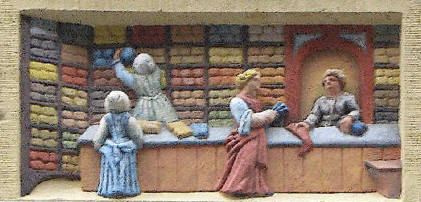 XVIIe-eeuwse gevelsteen kousenwinkel Amsterdam